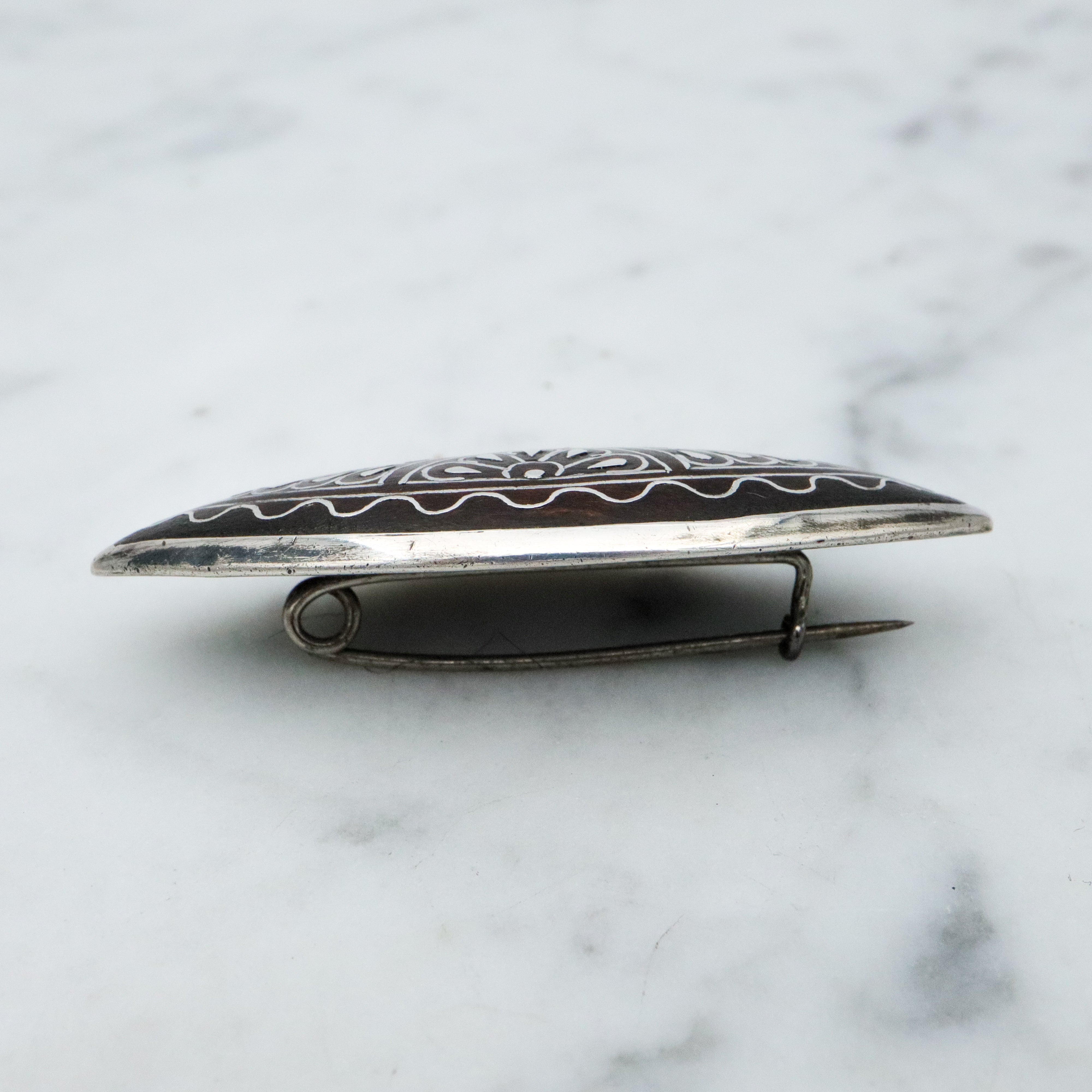 Antique Victorian silver inlaid wood elliptical brooch